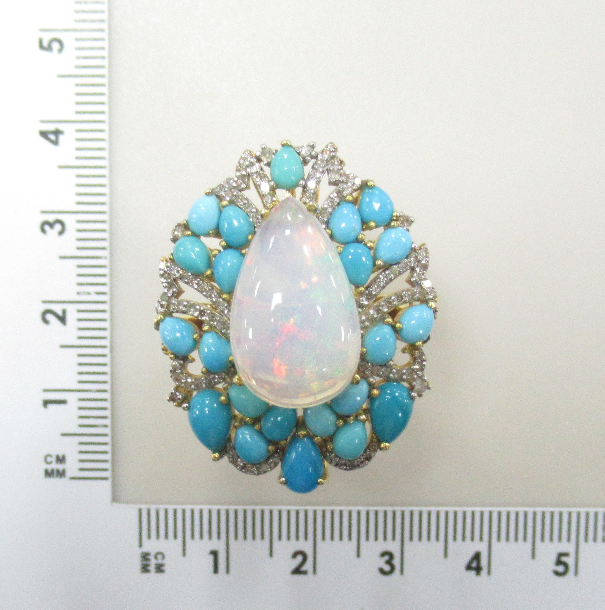 Серебряное кольцо 925 пробы; вставки 1 Опал белый (Эфиопия) 6,25ct; 118 Бр.Кр-17 0,74ct 2/4; 22 Бирюза 4,51ct;